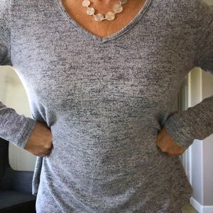 Button grey back sweater.